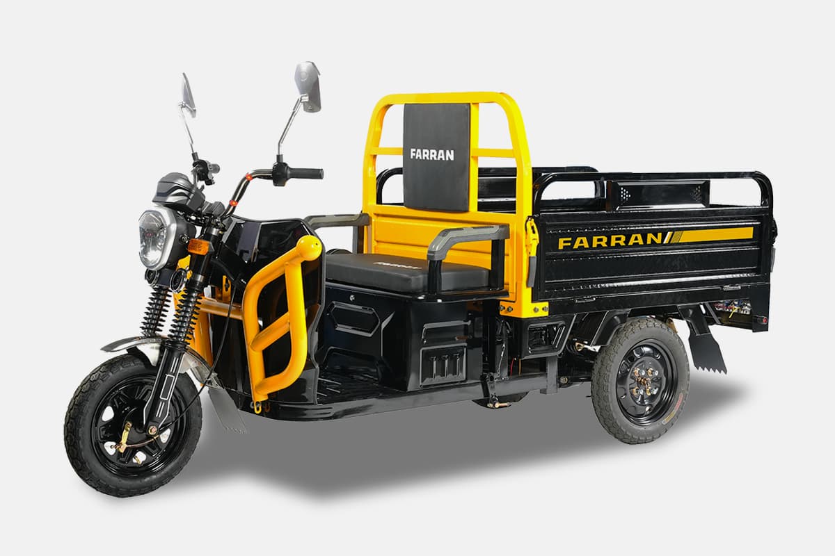 Three-wheeled motor vehicle with yellow and black design on a gray background