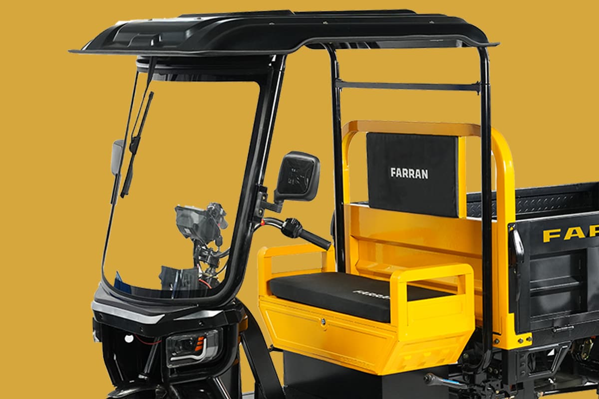 Yellow golf cart with black canopy on a yellow background